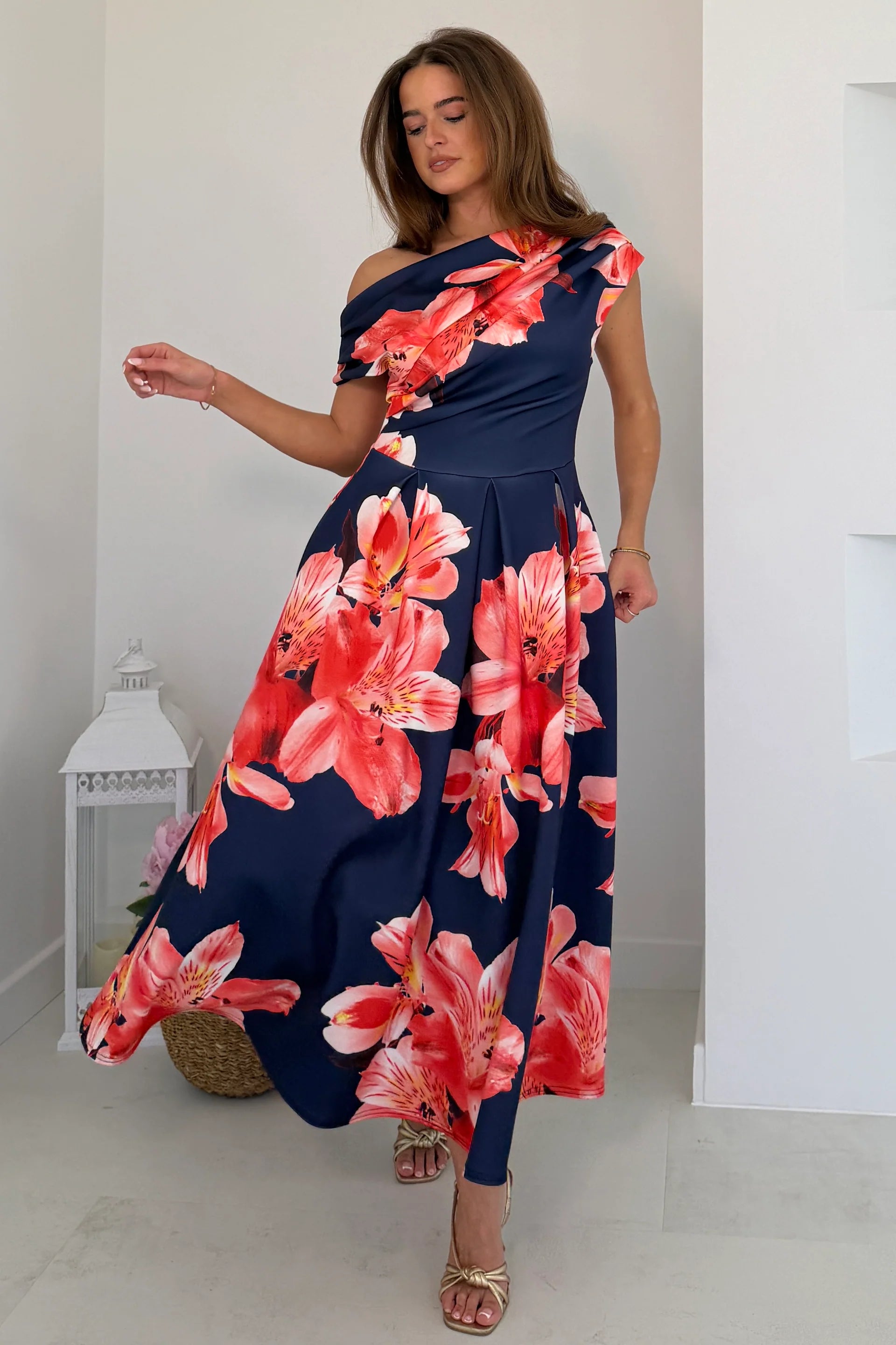 Front view of Betty asymmetric floral print midi dress in navy mix