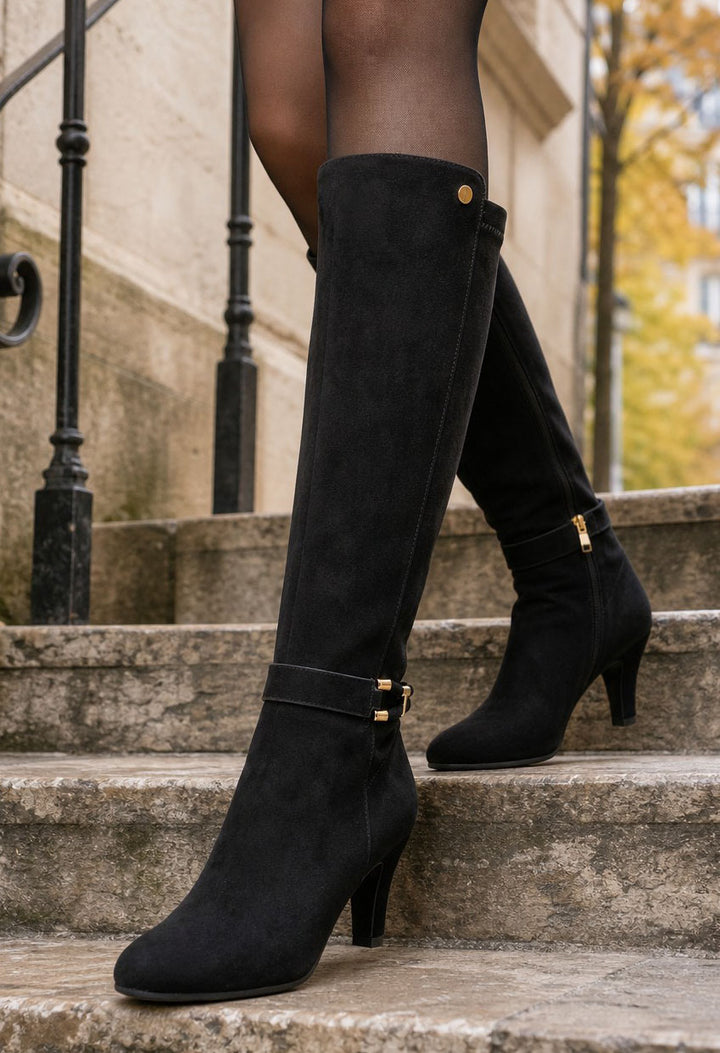 knee high heeled boot with gold buckle