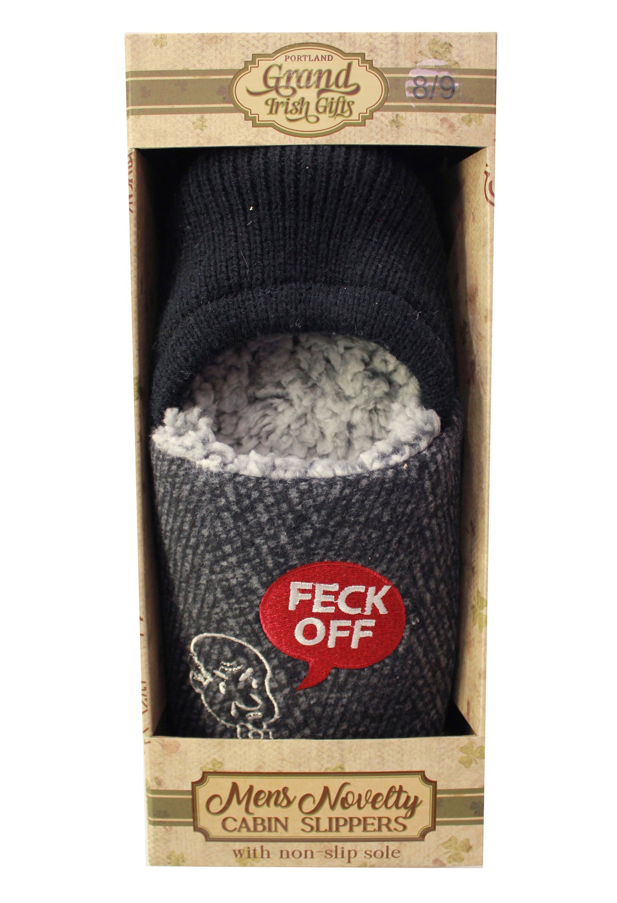 A novelty men's slipper in retail packaging. The slipper has a dark gray knit exterior, a light gray faux-fur lining, and a red speech-bubble graphic that reads 'FECK OFF'.