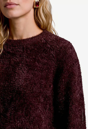 Fluffy sweater with glitter