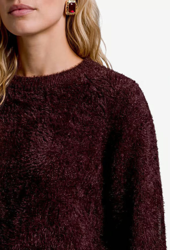 Fluffy sweater with glitter