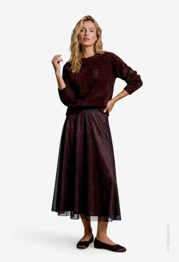 Fluffy sweater with glitter