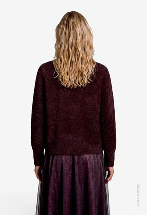 Fluffy sweater with glitter