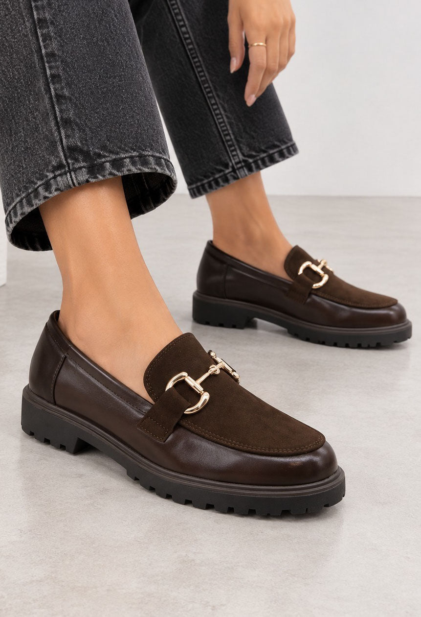 brown loafer with golden buckle