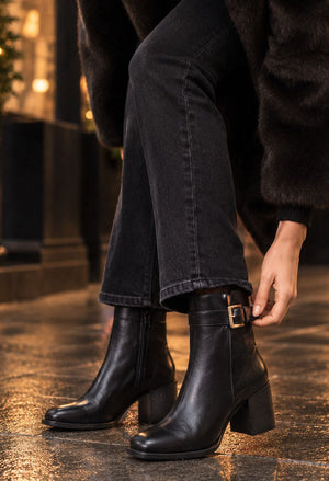 black ankle boot with buckle
