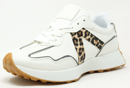 A pair of white faux leather sneakers with a cleated sole and lace-up style. With a leopard print detail