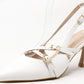 White sandal with clear strap on a white background