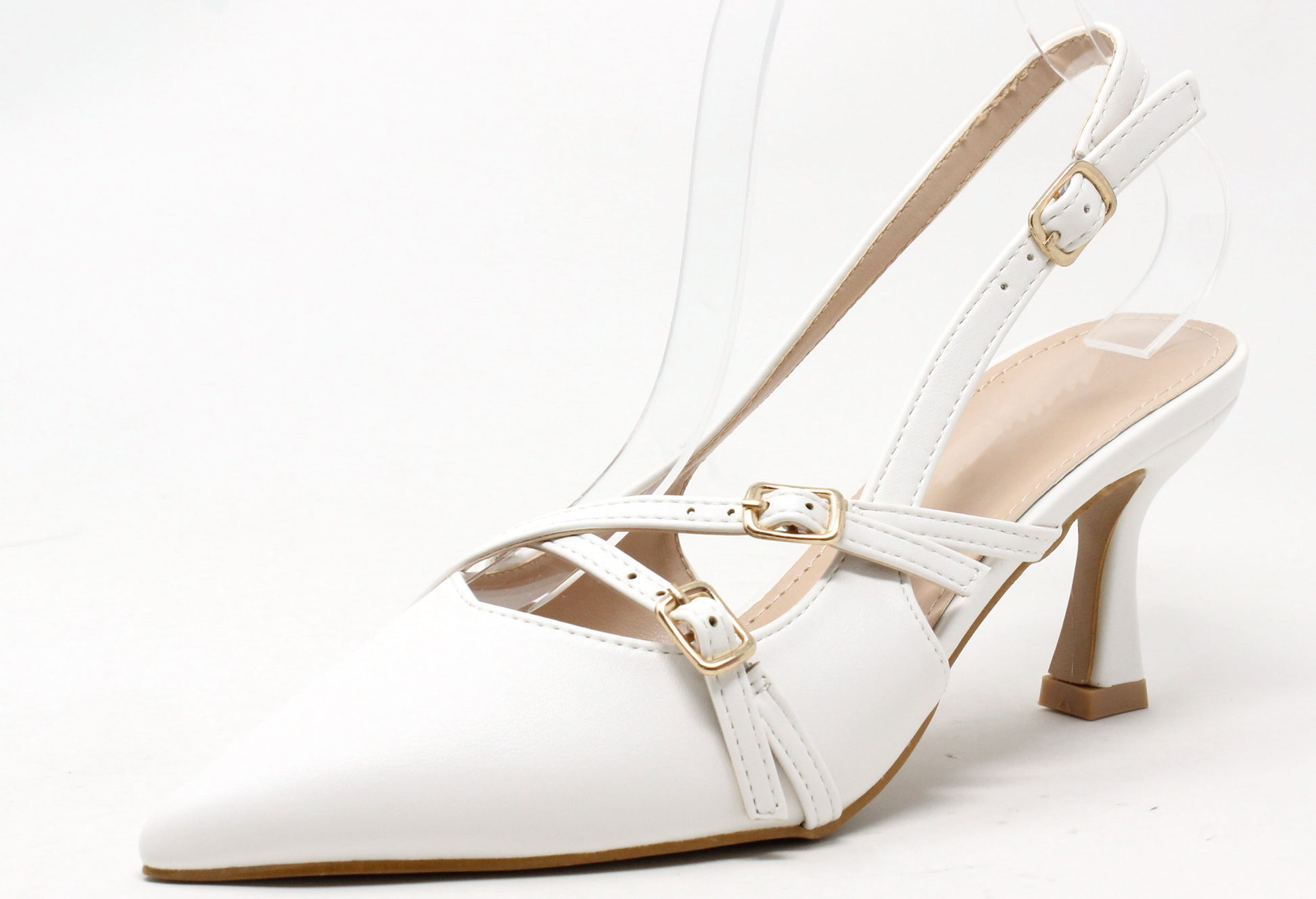 White sandal with clear strap on a white background