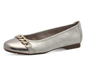 A beige flat shoe with a shimmer finish and chain detail, featuring gold hardware and a round toe.