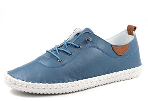 Blue leather plimsoll on a white background