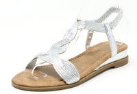 Silver sandal with a beige sole on a white background