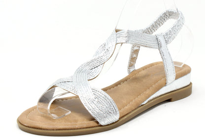 Silver sandal with a beige sole on a white background