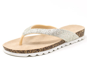 Beige sandal with glittery strap on a white background