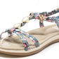 Floral sandal with a beige sole on a white background