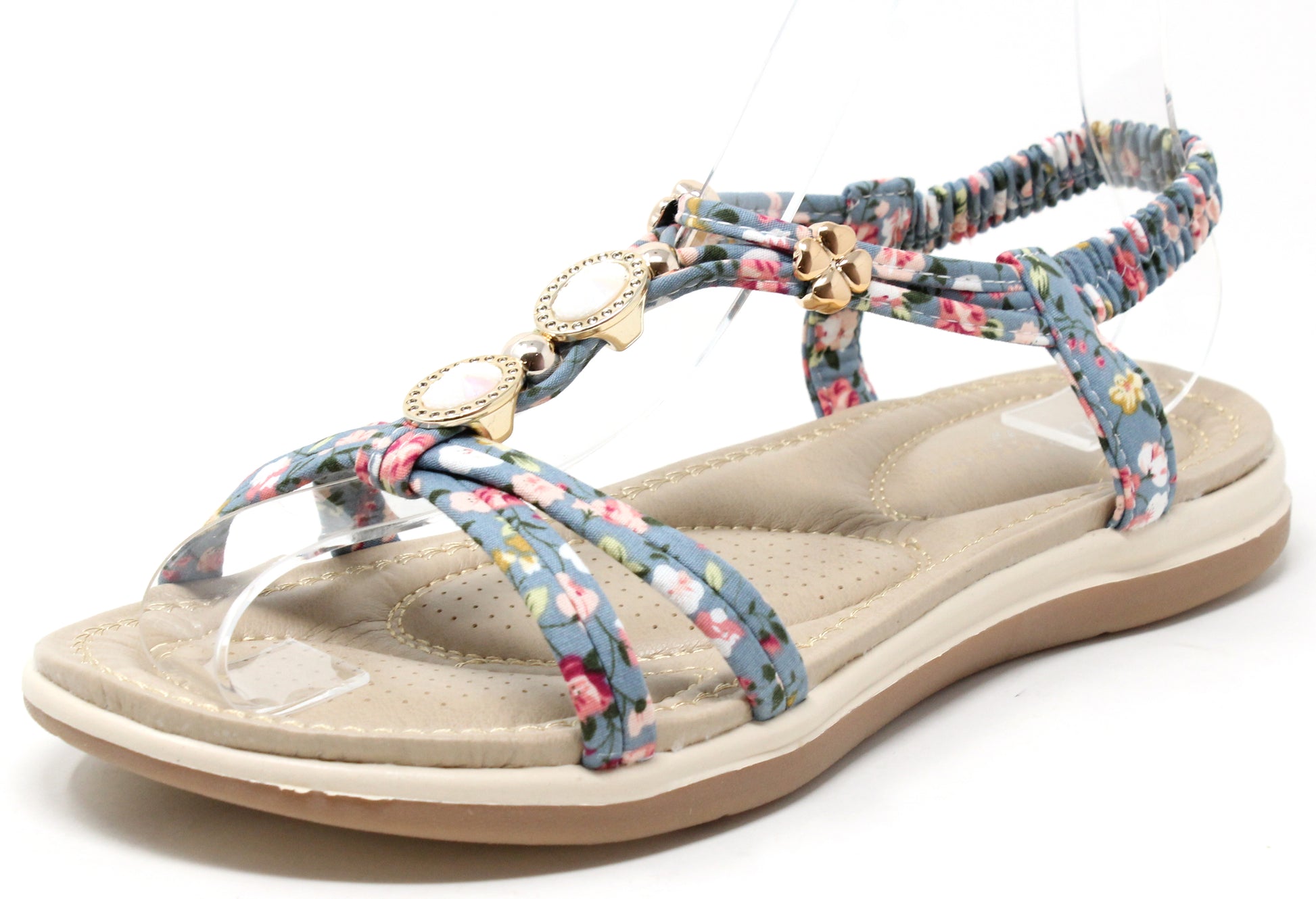 Floral sandal with a beige sole on a white background