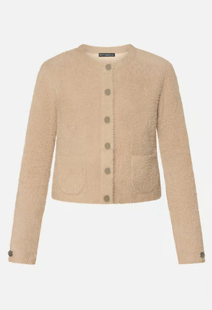 Beige cardigan with button details on a white background