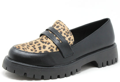 Loafer shoe with leopard print strap on a white background