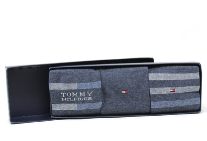 Set of three Tommy Hilfiger socks in a black box on a white background