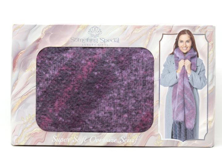 Packaged purple scarf with a woman wearing it on a marble background