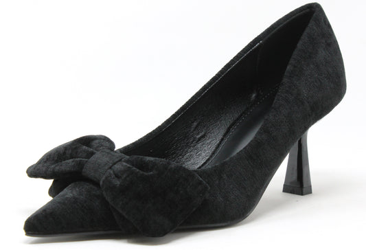 Black suede high heel shoe with a bow on a white background