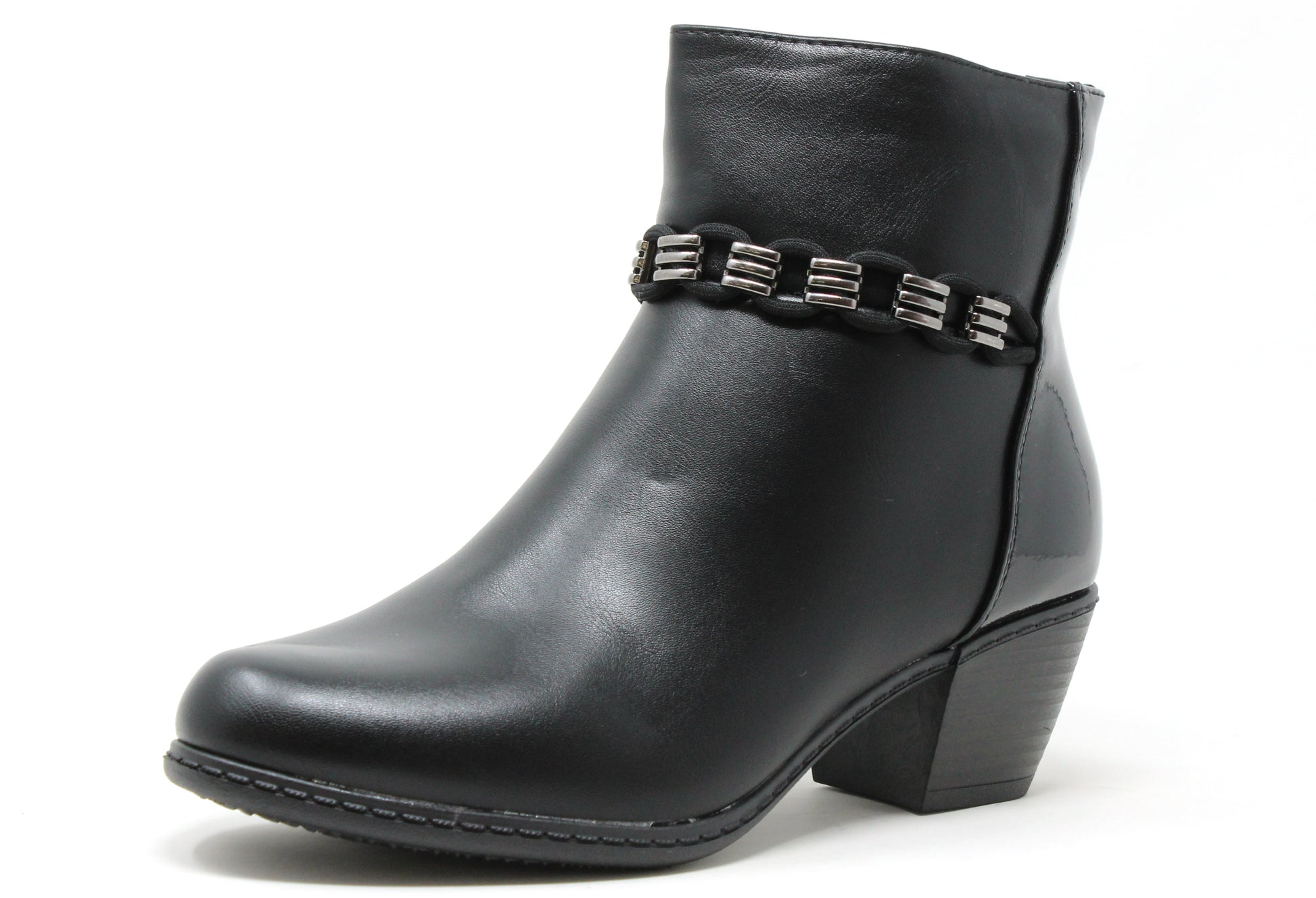 Black ankle boot with decorative straps on a white background