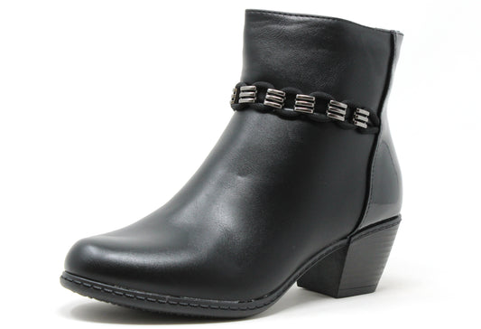 Black ankle boot with decorative straps on a white background