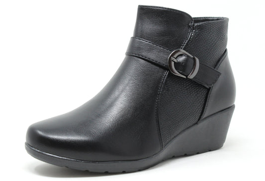 lightweight wedge boot with buckle detail on a white background