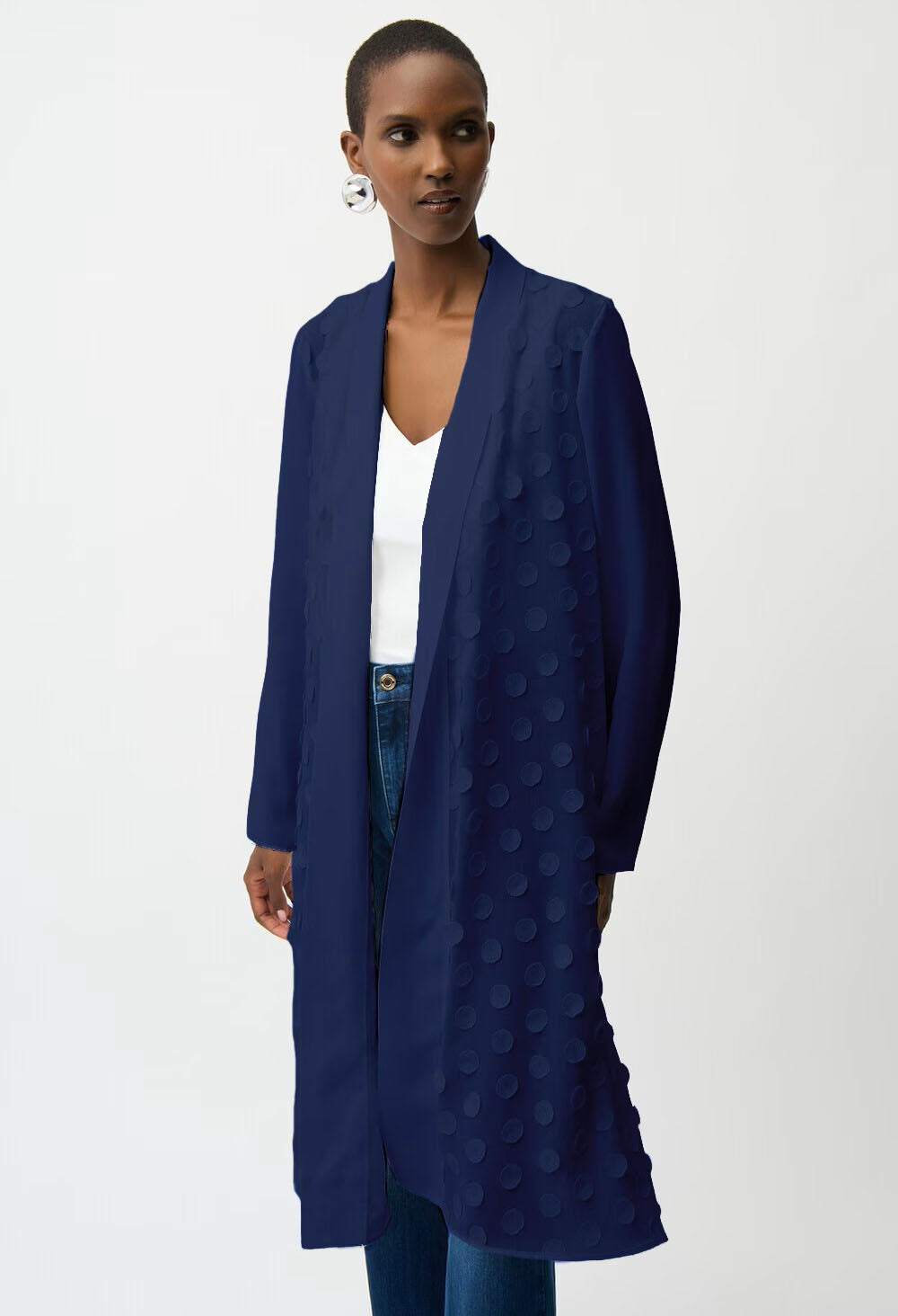 woman wearing an open navy cardigan