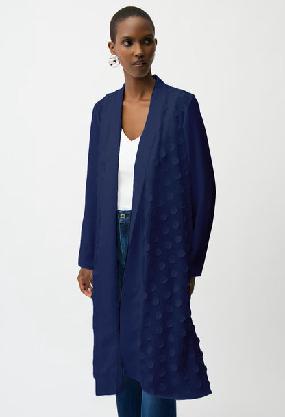 woman wearing an open navy cardigan