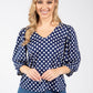 polka dot top in navy