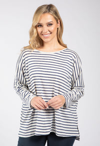 Woman wearing a striped long-sleeve top on a white background