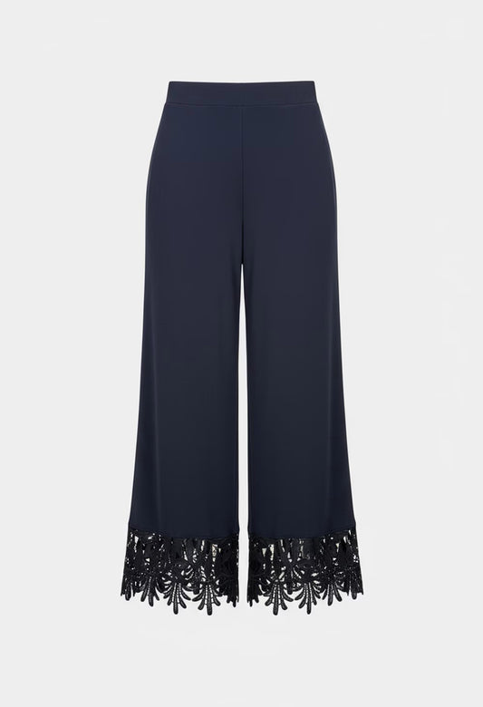 Navy blue pants with black sequin trim on a white background
