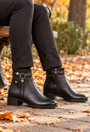 black ankle boot with ring buckle detail
